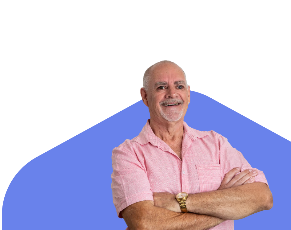Photo of man smiling with crossed arms
